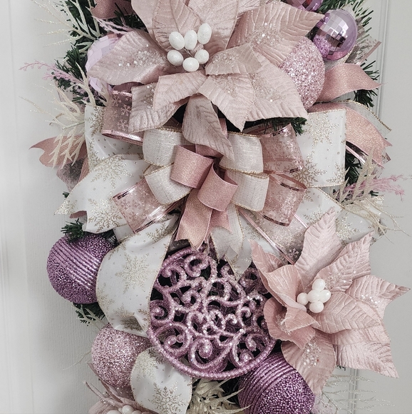 Light Pink Purple and White Christmas Swag with Pink Poinsettia and Ornaments.
